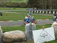 Passing a Steel Framed 600 at Paddock bend